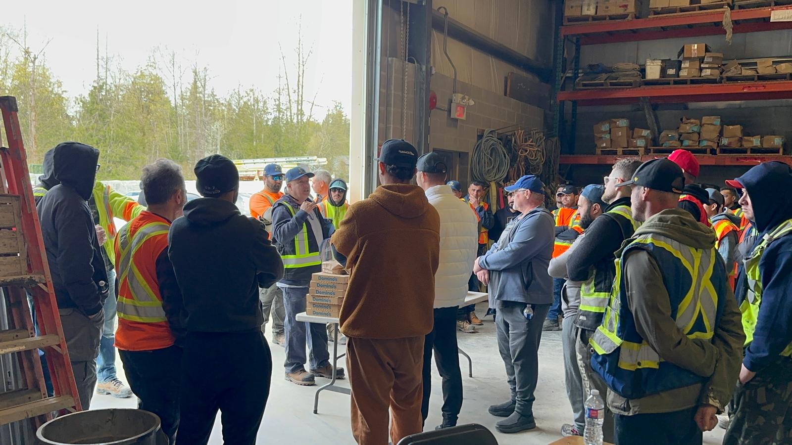 Workers practising safety procedures hands-on