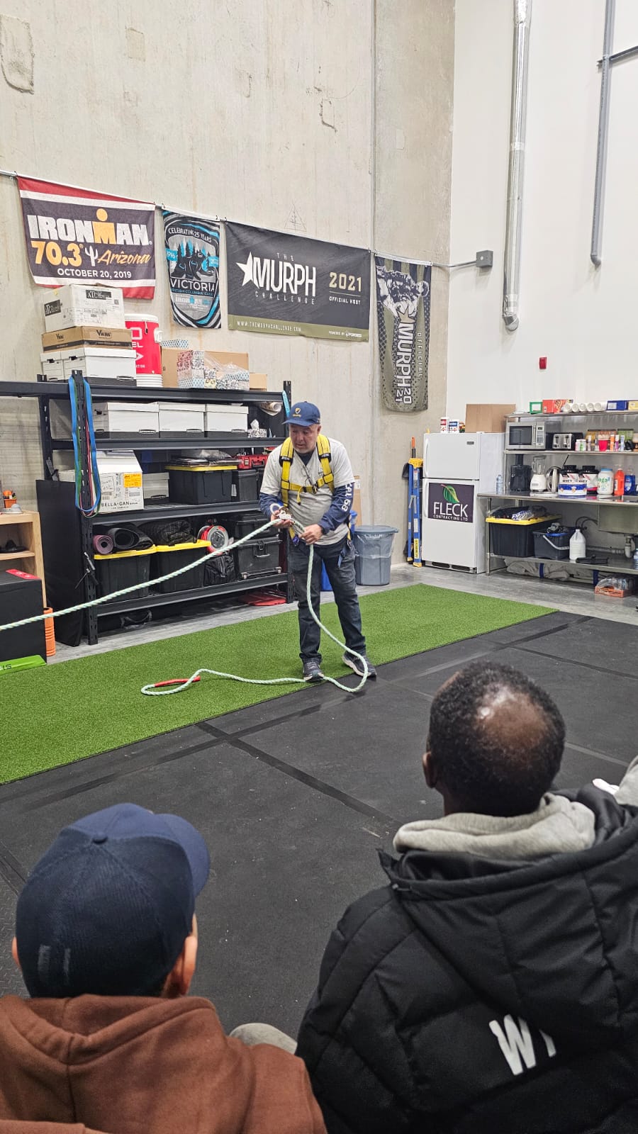 Workers receiving hands-on certification training